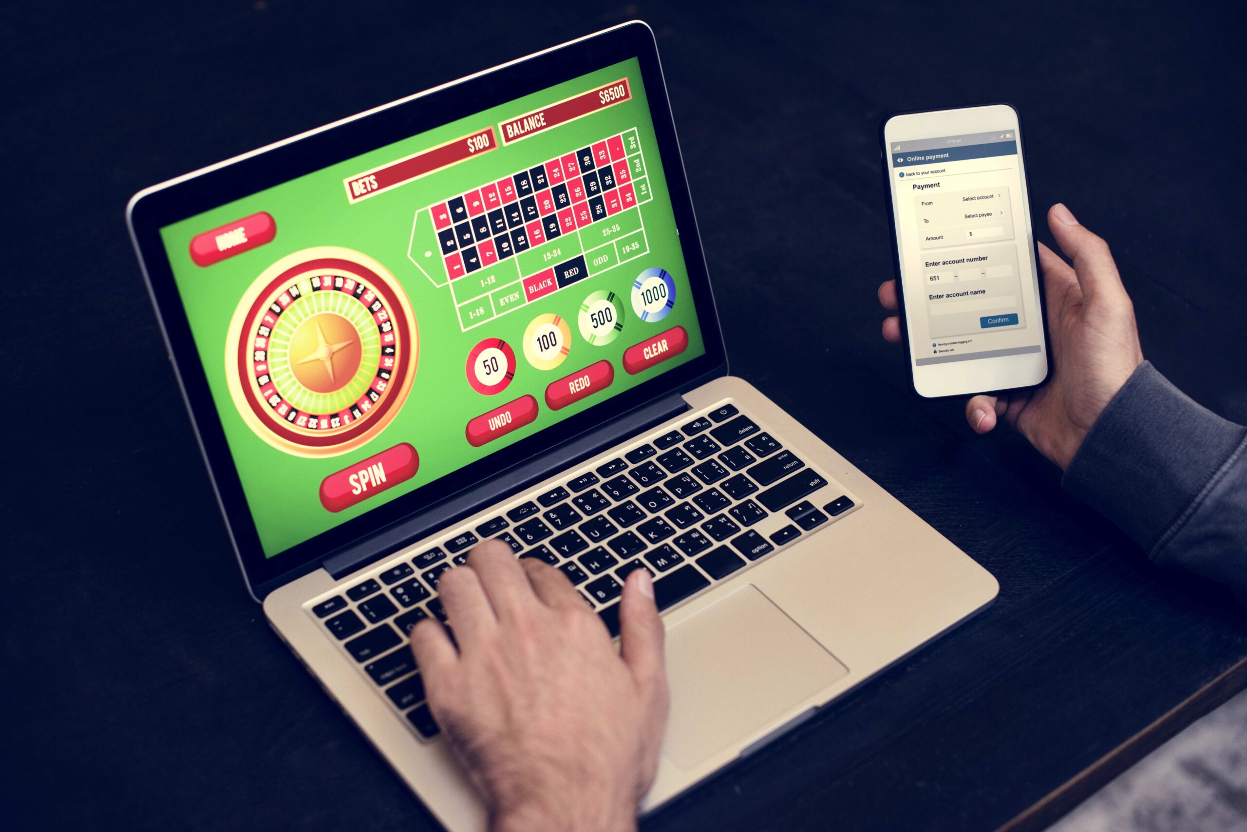 hand-holding-credit-card-playing-online-gambling-casino-slot-content-image