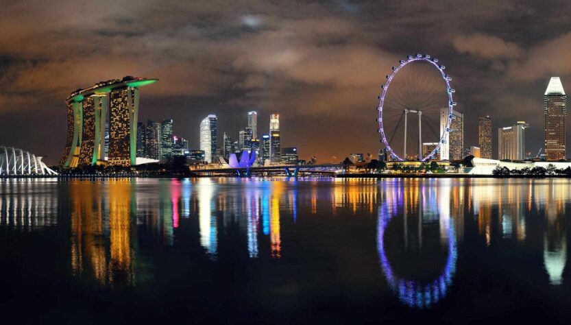 Singapore skyline night Marina Bay online betting legal guide 2026